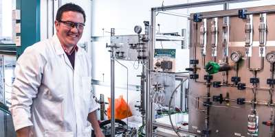 Dr Richard Bourne from the University of Leeds with equipment that is helping to transform the way medicines and other chemicals are produced