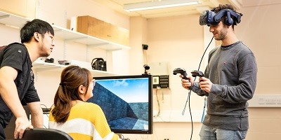 Students using VR equipment