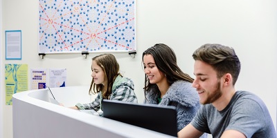Students studying on computers