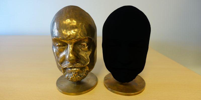 Human head sculpture coated with Vantablack.