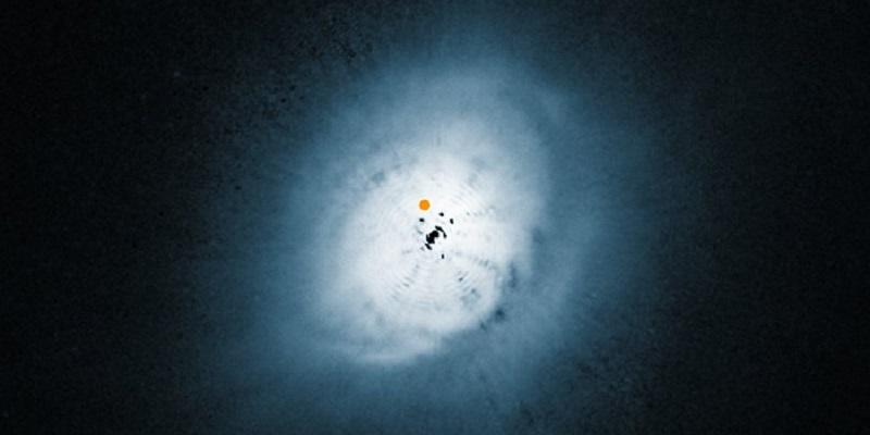 Discovery of methanol in a 'warm' planet-forming disk