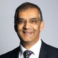 A headshot of Rashik Parmar MBE