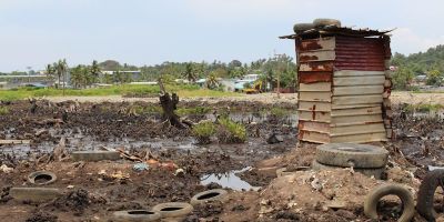 An unsafe toilet next to an informal settlement in Fiji