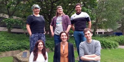 A photograph of a Dr Lorna Dougan and her colleagues.