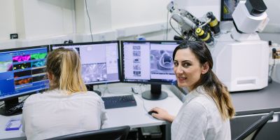 Students using electron microscopes in chemical engineering