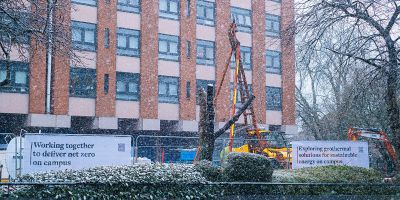 Geothermal drilling during snowy conditions outside of the Henry Price Residence building, 2025 (Credit: Ben Craven, School of Earth and Environment)