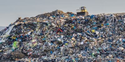 Huge piles of plastic and other garbage at an open-air refuse site