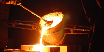 Pouring hot molten metal