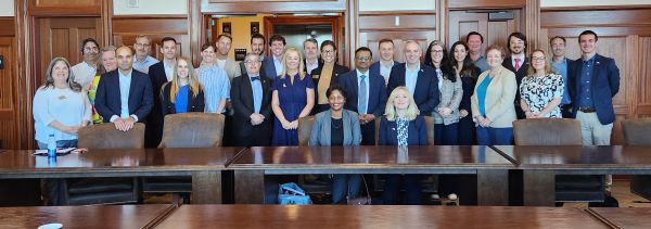 Tracy Brabin surrounded by over 20 delegates at Vanderbilt University.