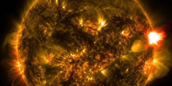 A close-up image of the Sun, showing solar flares and other storms on its surface.