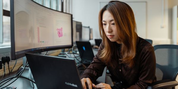 Female student working on a laptop