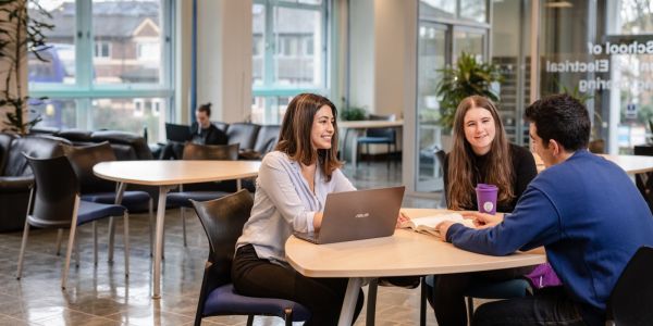 students chatting at the school foyer
