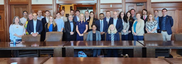 Tracy Brabin surrounded by over 20 delegates at Vanderbilt University.