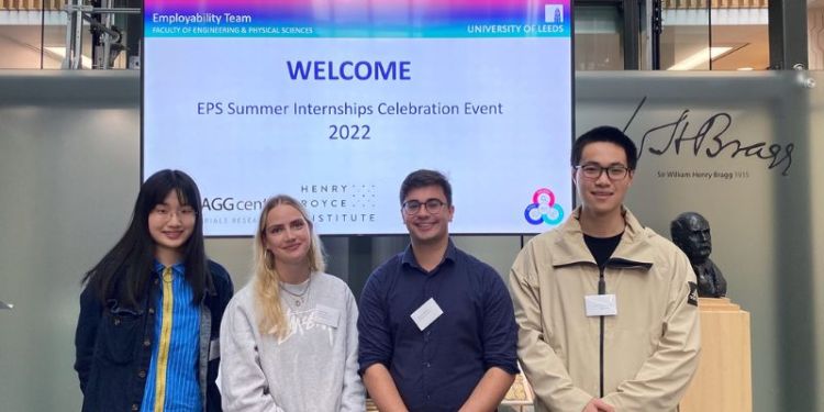 A photography of the four winners of the poster competition at the celebration event for the Faculty of Engineering and Physical Sciences Summer Internship Scheme.