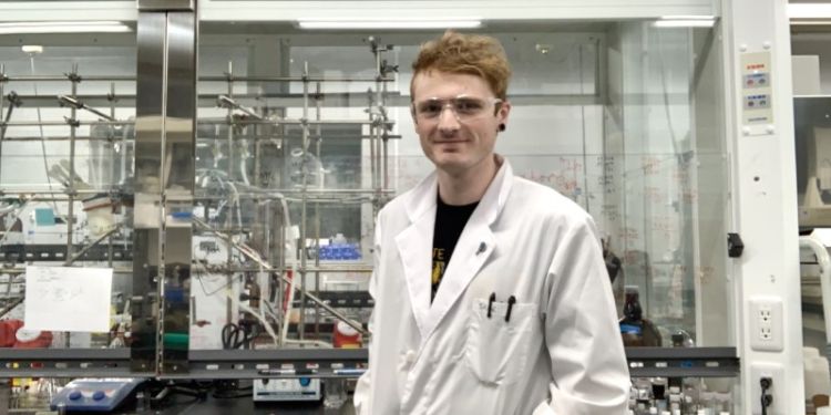 picture of jake hauser in a lab