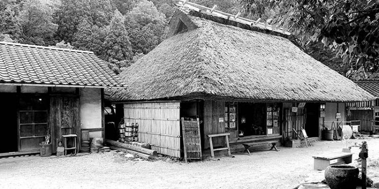 Black and white picture of an old house as part of an ecomuseum