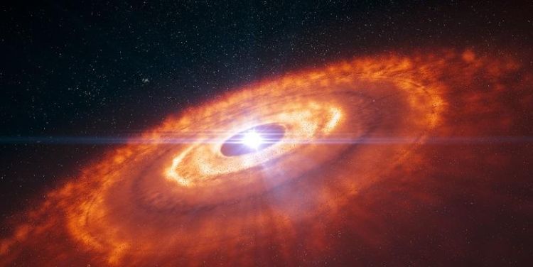 An artist's impression of planets forming in the ring of gas and dust surrounding a star.