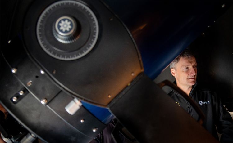 Matthias Maurer inside one of the telescopes on the Bragg Building roof