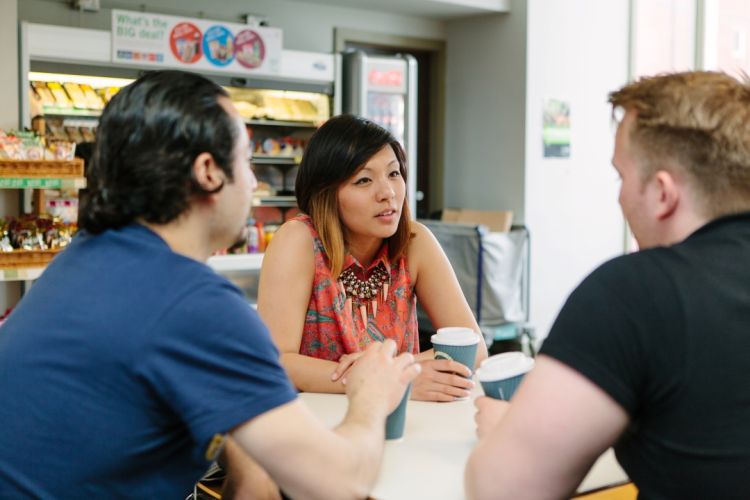 Chemical Engineering student Melissa Huang chats with friends at a university cafe