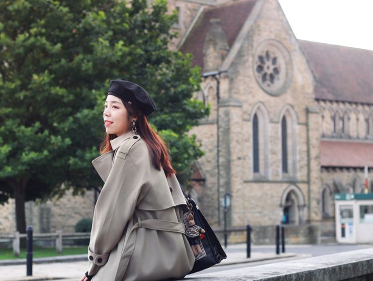 Civil Engineering student Qian Ye outside the University of Leeds School of Business.