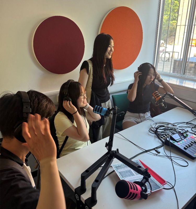 Korean students using recording equipment at the University of Leeds.
