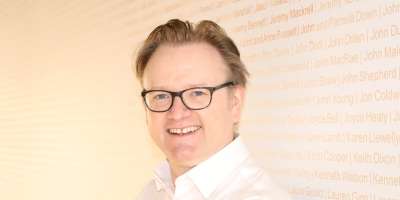 A headshot of Dan Trowsdale.