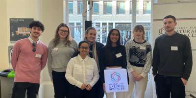 Seven students attending the society for natural sciences student conference