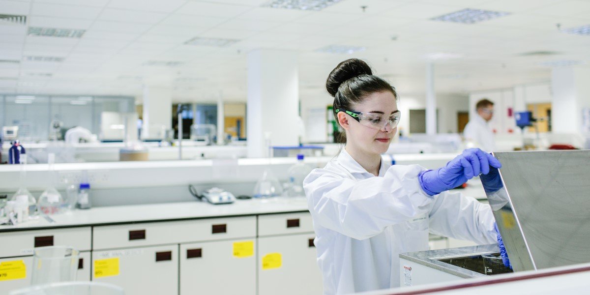 female student working in chemistry lab