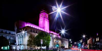 A photograph of the Parkinson Building lit up for Light Night.