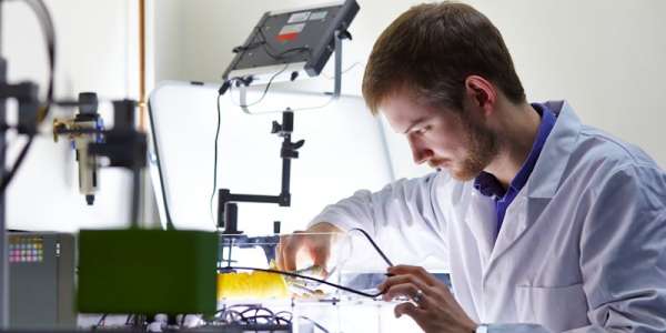 Mechanical Engineering postgraduate researcher using facilities