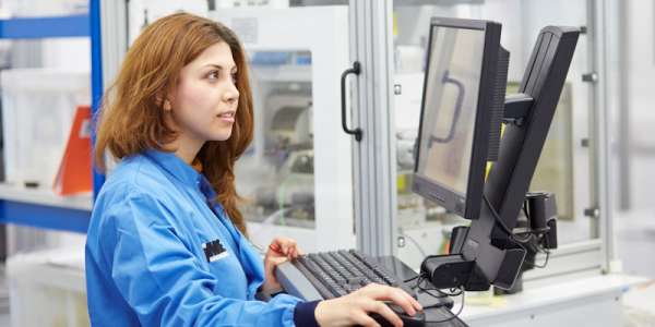 Female undergraduate medical engineering student working in lab