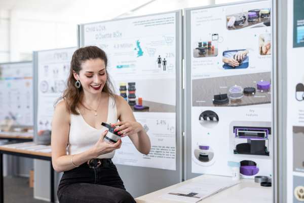 Product design student at the product design showcase with her project Child Lock