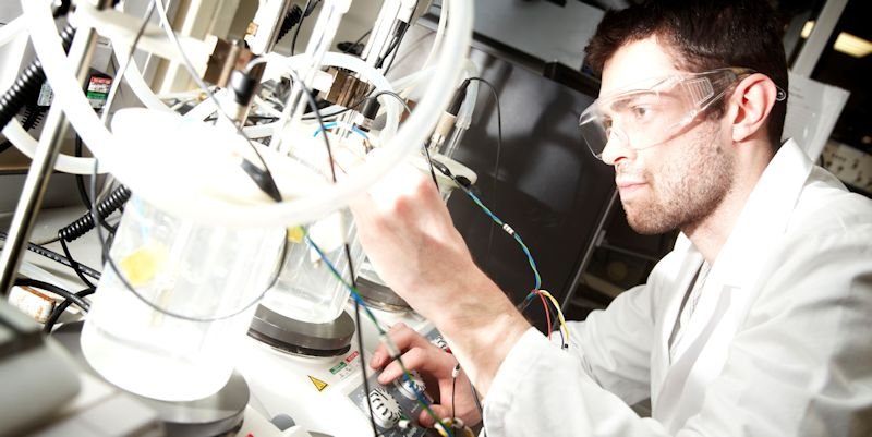 mechanical masters student working in laboratory